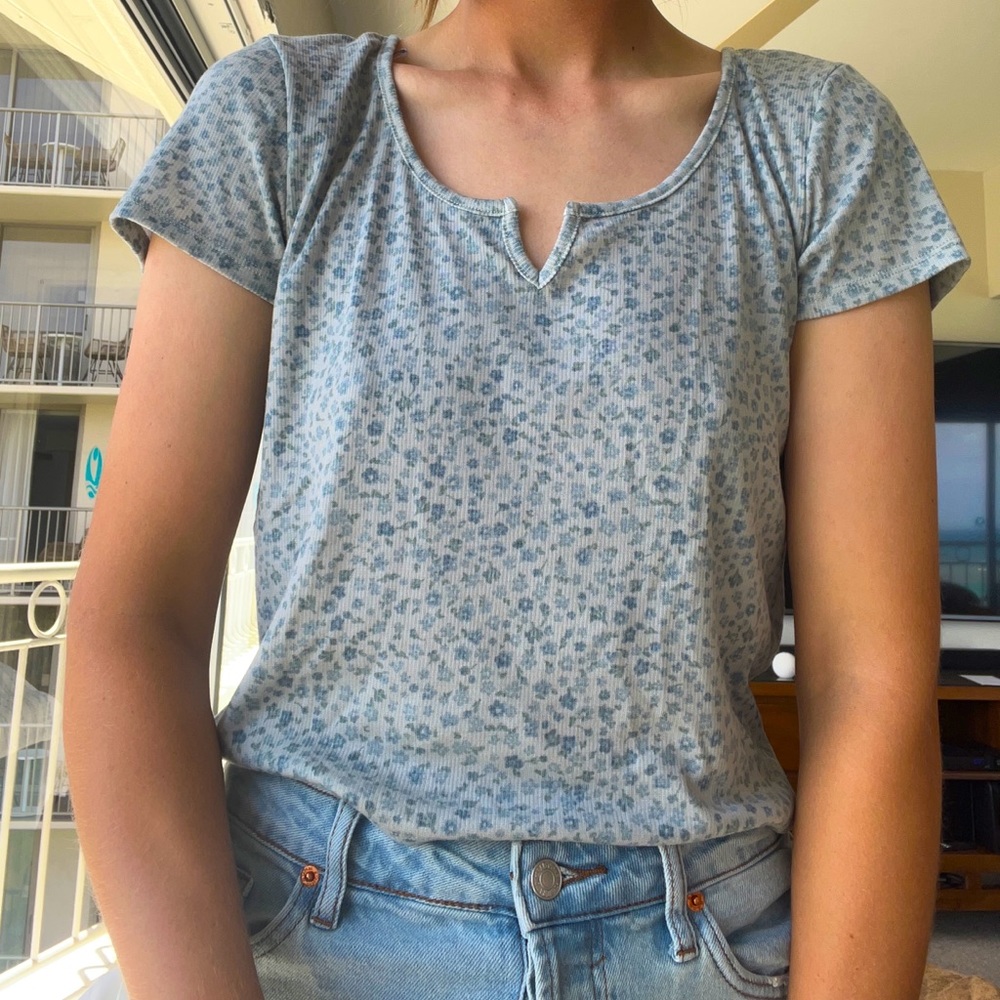 Blue top with a sweet dainty floral print.